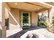 Covered patio with tiled flooring and sliding glass door to the interior at 8224 Opal Falls St, North Las Vegas, NV 89085