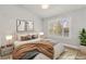 Inviting bedroom with ample natural light, stylish decor, and comfortable furnishings, creating a serene atmosphere at 8528 Sierra Cima Ln, Las Vegas, NV 89128