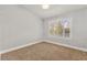 Cozy bedroom features neutral carpet and shuttered windows offering lots of natural light at 8528 Sierra Cima Ln, Las Vegas, NV 89128