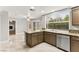 Open kitchen showcasing stainless steel appliances and a large window at 8528 Sierra Cima Ln, Las Vegas, NV 89128