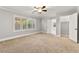 Open living room with natural light and a fireplace at 8528 Sierra Cima Ln, Las Vegas, NV 89128