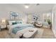 Serene main bedroom featuring neutral tones, plush bedding, and plenty of natural light at 8528 Sierra Cima Ln, Las Vegas, NV 89128