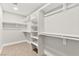 Organized walk-in closet with built-in shelving and ample storage space at 8528 Sierra Cima Ln, Las Vegas, NV 89128