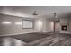 Basement media room area with carpet and fireplace at 9904 Moonridge Ct, Las Vegas, NV 89134