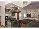 Kitchen with granite countertops and stainless steel appliances and island with gas cooktop at 9904 Moonridge Ct, Las Vegas, NV 89134