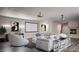Living room featuring a media area, fireplace, and neutral color palette at 9904 Moonridge Ct, Las Vegas, NV 89134