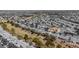 Aerial view of home nestled in a quiet golf community with desert landscaping at , Las Vegas, NV 89134