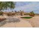 This backyard includes a BBQ, covered patio, and artificial turf at , Las Vegas, NV 89134