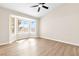 Bright bedroom featuring a bay window, hardwood floors, and neutral décor at , Las Vegas, NV 89134