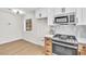 Modern kitchen with stainless steel appliances, tile backsplash, and ample counter space at , Las Vegas, NV 89134