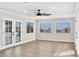 Bright living room with hardwood floors, lots of windows, and a ceiling fan at , Las Vegas, NV 89134