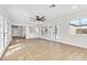 Bright living room featuring hardwood floors, lots of windows, and white trim at , Las Vegas, NV 89134