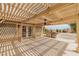 Cozy covered patio with ceiling fan and BBQ area with outdoor seating at , Las Vegas, NV 89134