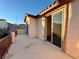 Private balcony with an entrance to the living area. Features a tile roof with stucco siding at 10145 White Mulberry Dr, Las Vegas, NV 89148