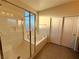 Bright bathroom featuring a shower, tub, and closet for comfort and functionality at 10145 White Mulberry Dr, Las Vegas, NV 89148