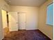 Bedroom with carpet, closet, and view of connecting rooms at 10145 White Mulberry Dr, Las Vegas, NV 89148