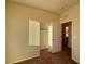 Well-lit bedroom with plush carpeting and a window at 10145 White Mulberry Dr, Las Vegas, NV 89148