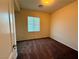 Neutral bedroom featuring plush carpet and a window at 10145 White Mulberry Dr, Las Vegas, NV 89148