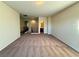Loft space with carpet, neutral walls, and view into a bathroom at 10145 White Mulberry Dr, Las Vegas, NV 89148