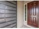 Contemporary front door with brick paving and mesh screen at 10943 Doresta Ave, Las Vegas, NV 89166
