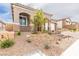 Inviting front exterior with stone accents and desert landscaping at 10943 Doresta Ave, Las Vegas, NV 89166