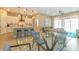 Kitchen and living area combination, featuring modern appliances and comfortable seating at 10943 Doresta Ave, Las Vegas, NV 89166