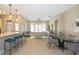 Open-concept living area with modern decor and bright natural lighting at 10943 Doresta Ave, Las Vegas, NV 89166