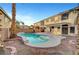 A tranquil backyard setting with a refreshing pool and patio area for outdoor enjoyment at 10965 Ladyburn Ct, Las Vegas, NV 89141
