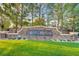 Royal Highlands community sign featuring manicured lawn, stone design, and colorful flowers at 10965 Ladyburn Ct, Las Vegas, NV 89141