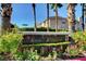 Community entrance with colorful flowers welcoming residents and guests at 10965 Ladyburn Ct, Las Vegas, NV 89141