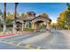 Community guard house showing classic architectural style with stone accents and a secure gated entrance at 10965 Ladyburn Ct, Las Vegas, NV 89141