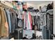 Walk-in closet featuring double rods, shelves, and ample storage space at 10965 Ladyburn Ct, Las Vegas, NV 89141