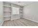 This spacious bedroom boasts built-in shelving for displaying decor and personal belongings at 11016 Meadow Leaf Ave, Las Vegas, NV 89144