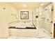 Relaxing bathroom with a luxurious soaking tub, separate glass-enclosed shower at 135 E Harmon Ave # 2916, Las Vegas, NV 89109