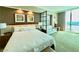 Relaxing bedroom features a king-size bed, scenic views, and comfortable seating at 135 E Harmon Ave # 2916, Las Vegas, NV 89109
