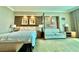 Comfortable bedroom with a queen-sized bed and a cozy living space with a sofa for relaxing at 135 E Harmon Ave # 2916, Las Vegas, NV 89109