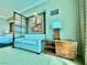 Seating area in a naturally lit room with a divider behind at 135 E Harmon Ave # 2916, Las Vegas, NV 89109