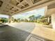 Circular driveway with well-manicured landscaping, leading to the grand entrance of the building at 135 E Harmon Ave # 2916, Las Vegas, NV 89109