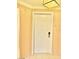 Neutral colored entryway with a white door and tile flooring at 135 E Harmon Ave # 2916, Las Vegas, NV 89109