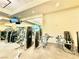 Gym featuring mirrored walls with weight machines and cardio equipment at 135 E Harmon Ave # 2916, Las Vegas, NV 89109