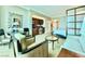 The living area features comfortable chairs, a dining table, and a kitchenette, great for entertaining at 135 E Harmon Ave # 2916, Las Vegas, NV 89109