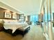 Comfortable main bedroom suite features a king bed, city views, and ensuite bath at 135 E Harmon Ave # 2916, Las Vegas, NV 89109