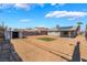 The backyard is large and features a storage shed and block-wall fence at 1437 Price St, Henderson, NV 89011