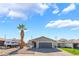 Charming single-story home with a well-maintained front yard and a two car garage at 1437 Price St, Henderson, NV 89011