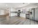 Bright, open kitchen featuring stainless steel appliances, a white subway tile backsplash at 1437 Price St, Henderson, NV 89011