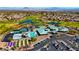 Expansive aerial view of the community featuring a golf course, pool, and clubhouse at 1803 Eagle Village Ave, Henderson, NV 89012