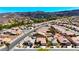 An aerial view of a community showcasing well-maintained landscaping and residential properties at 1803 Eagle Village Ave, Henderson, NV 89012