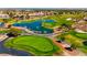 Aerial view of the golf course and pond, showing a lush, green landscape at 1803 Eagle Village Ave, Henderson, NV 89012