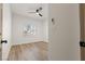 Bedroom featuring wood-look floors and plantation shutters on the window at 1803 Eagle Village Ave, Henderson, NV 89012