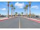 Well-maintained community center with ample parking and a welcoming entrance lined with palm trees at 1803 Eagle Village Ave, Henderson, NV 89012